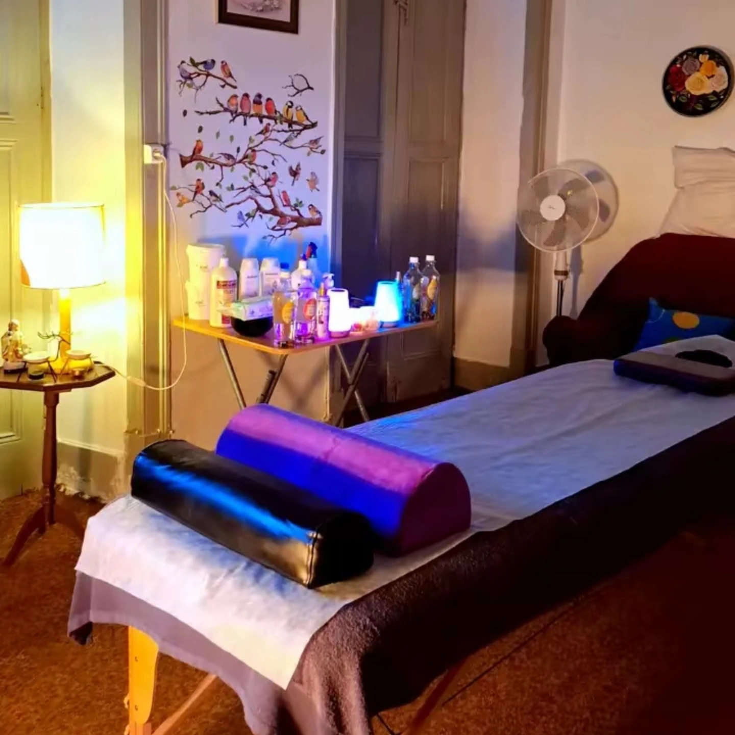 Peaceful massage room with soft lighting